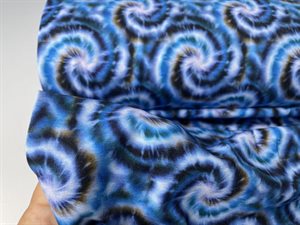 Bomuldsjersey - cool spiraler med batik effekt i blå toner